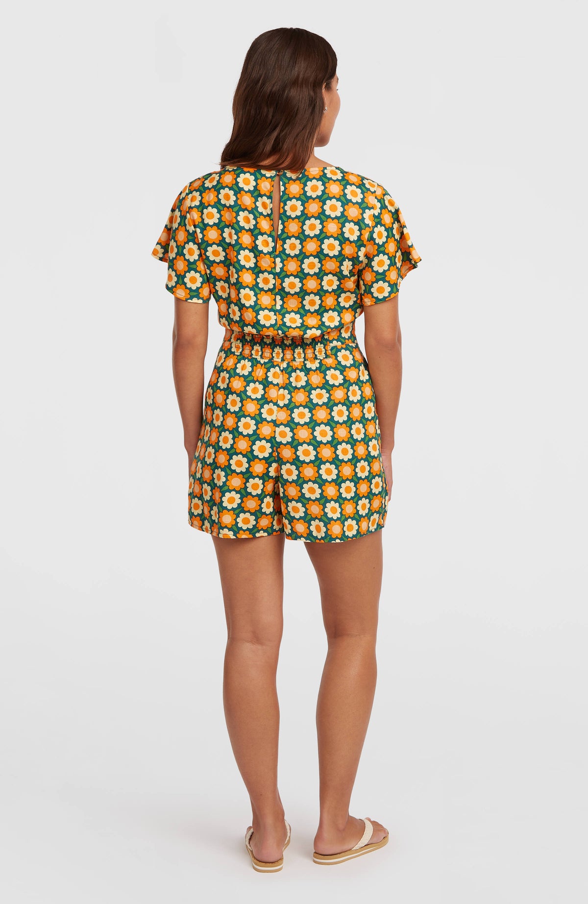 O'Riginals Playsuit für Damen, grün mit Blumenmuster in Orange und Gelb, Rückansicht mit elastischem Taillenbund