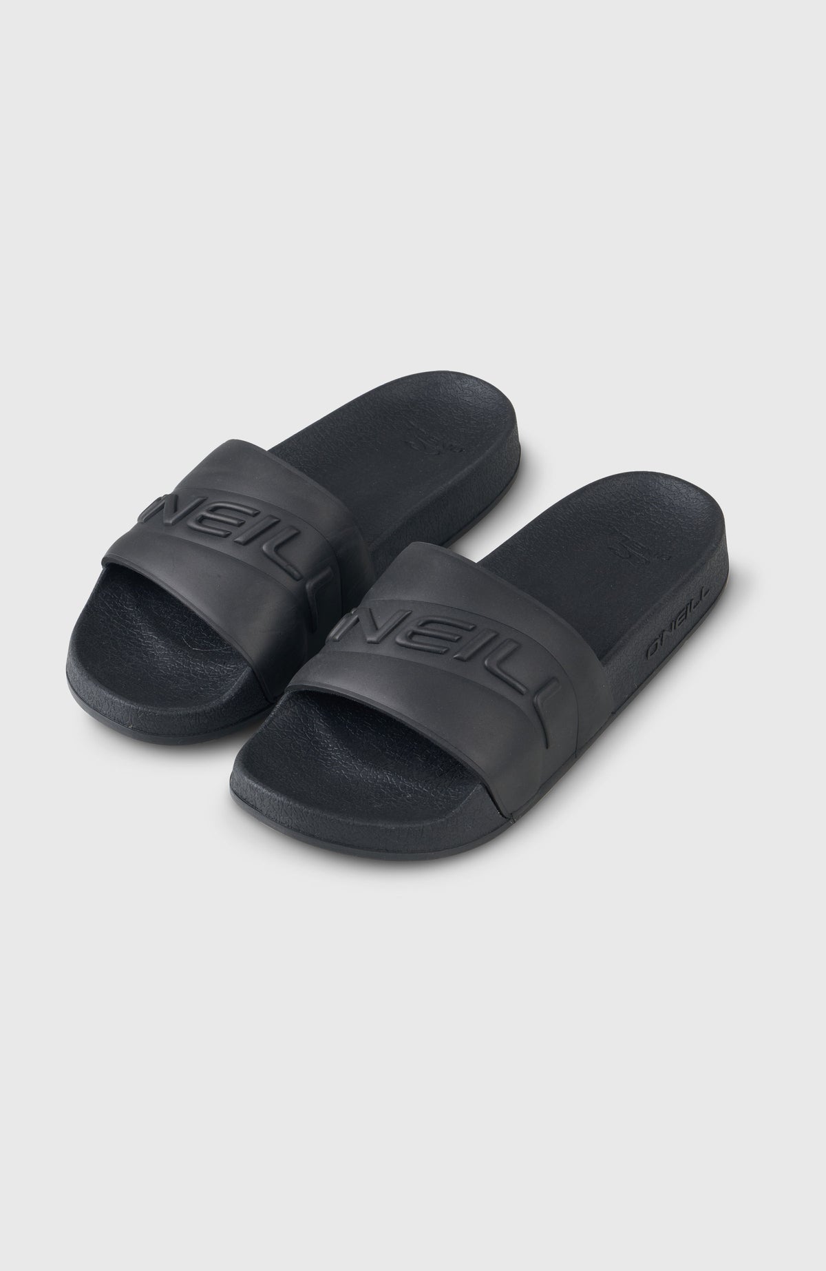 O'Neill Embossed Slides für Damen, schwarz, Paar freigestellt von schräg oben