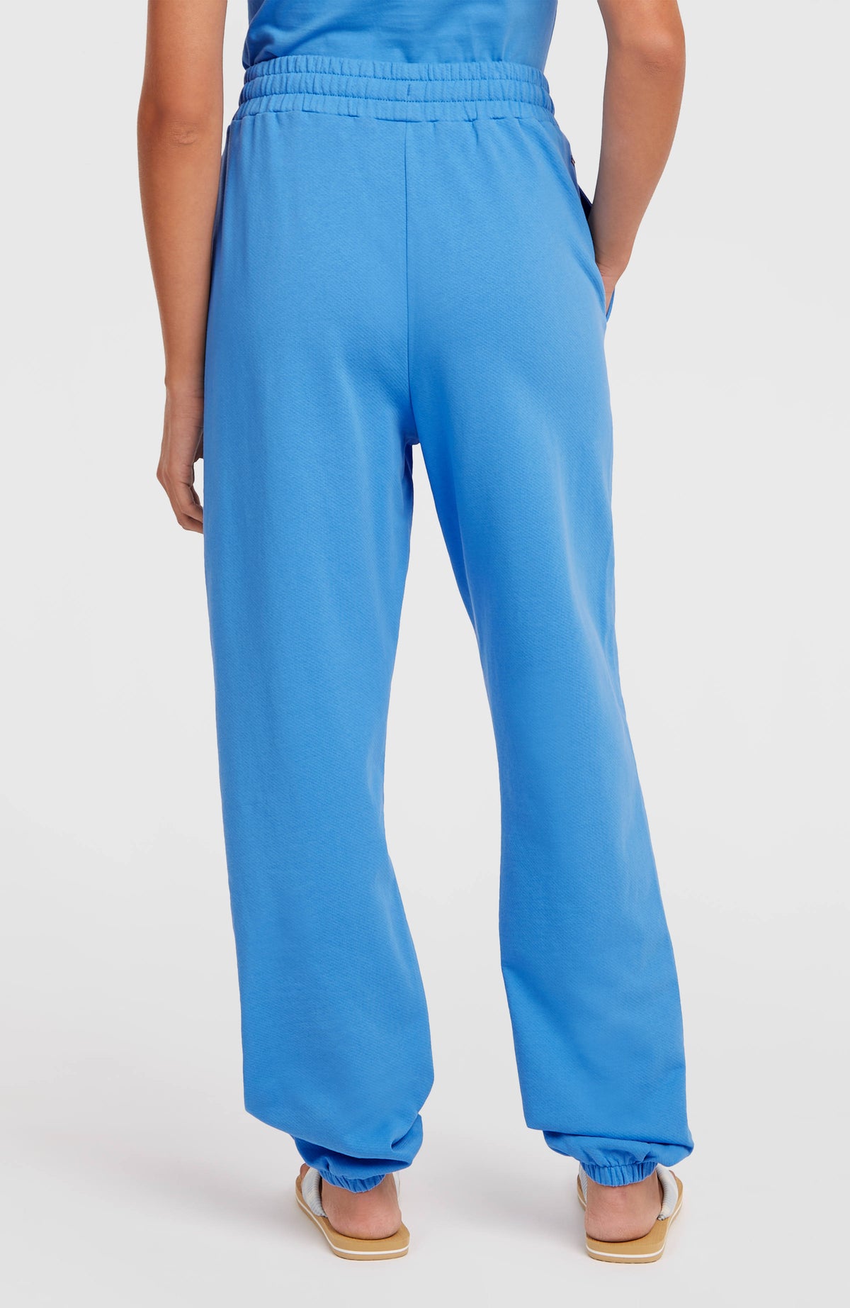 Women of the Wave Jogginghose für Damen, blau, Rückansicht am Model, elastischer Bund
