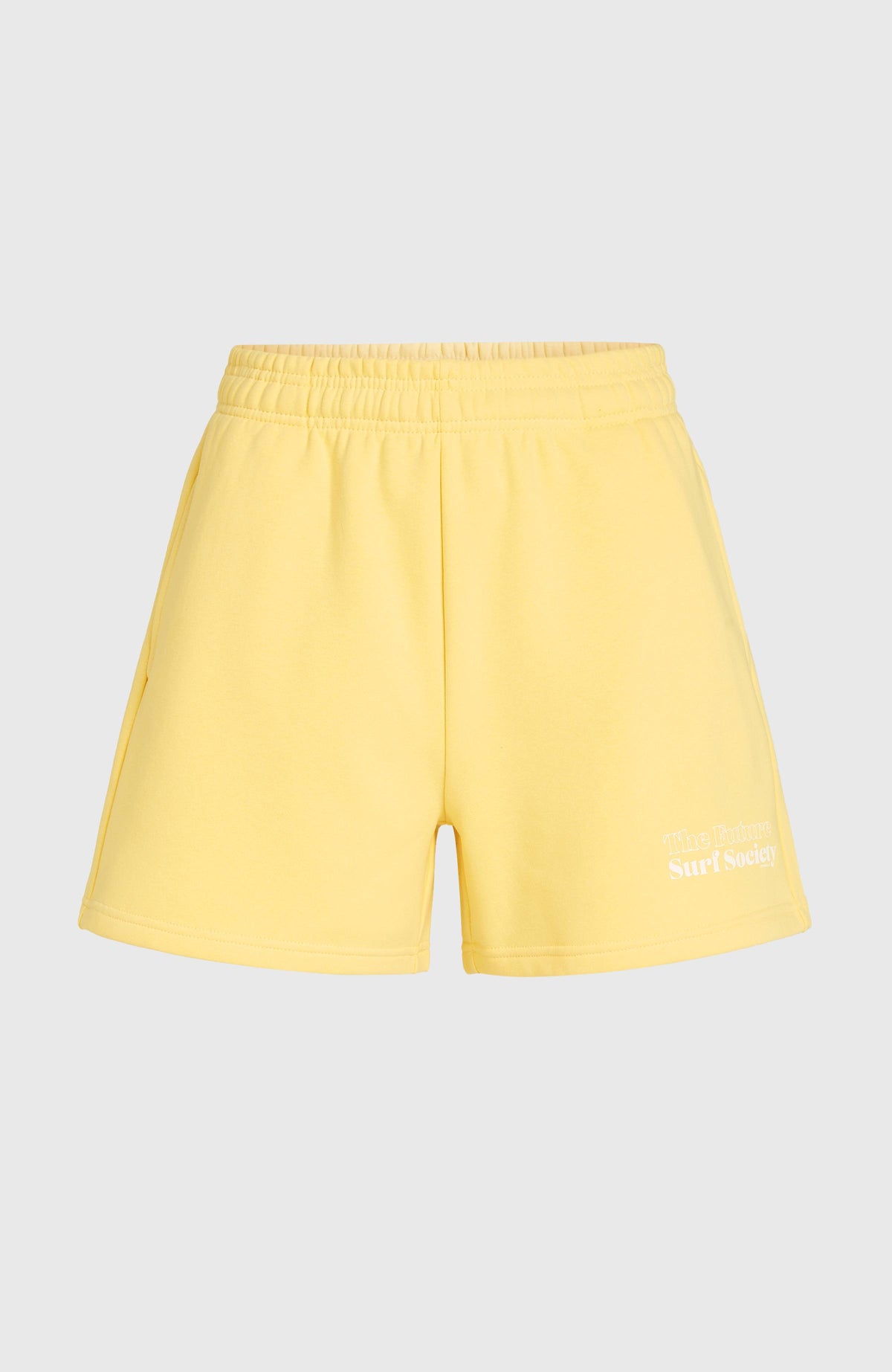 Future Surf Society Shorts für Damen, gelb mit Logo-Print in Weiß, flach liegend von vorne mit elastischem Bund