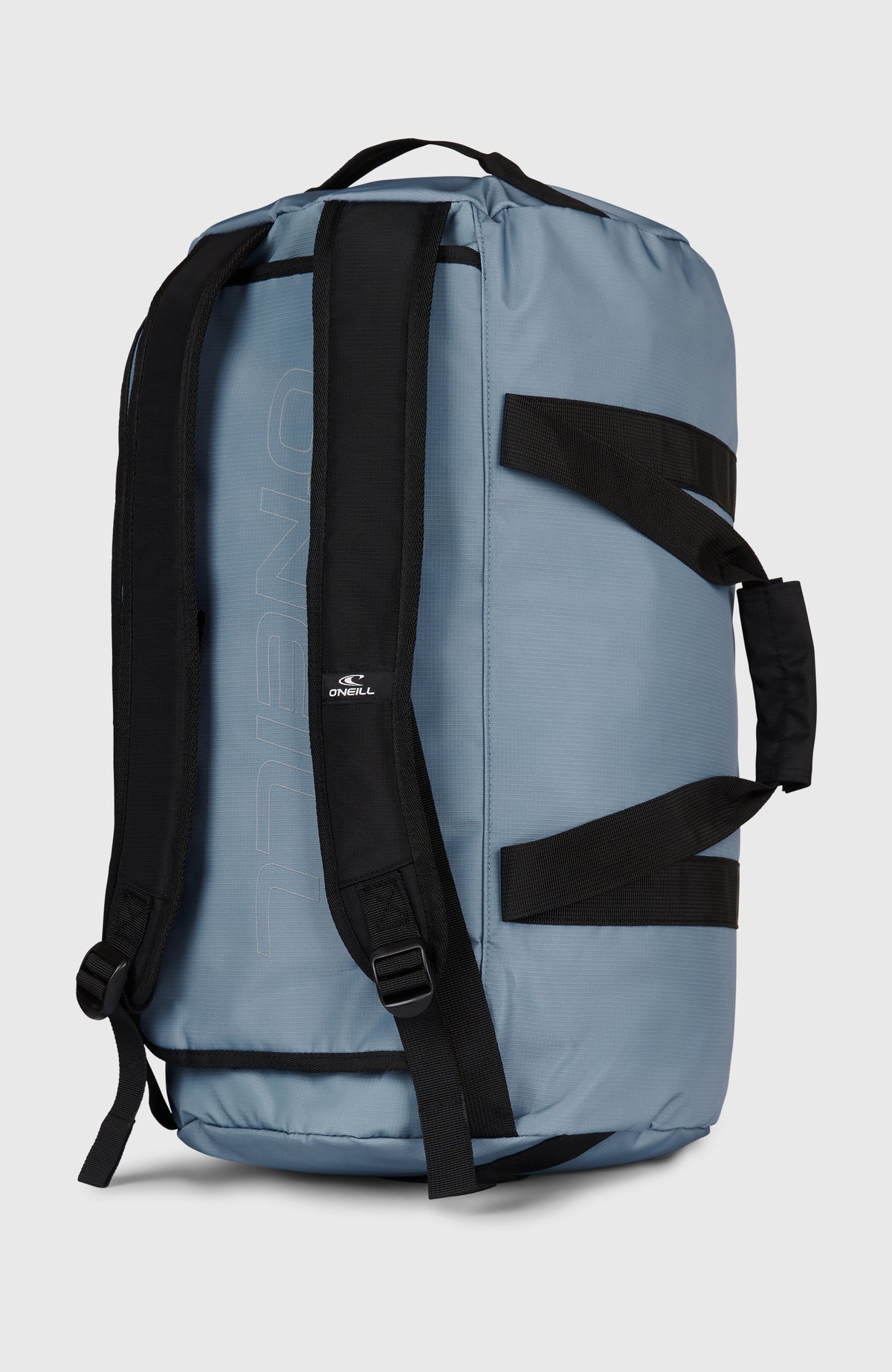 Blaue Reisetasche, freigestellt aufrecht in Ansicht von hinten mit gepolsterten Rucksackträgern