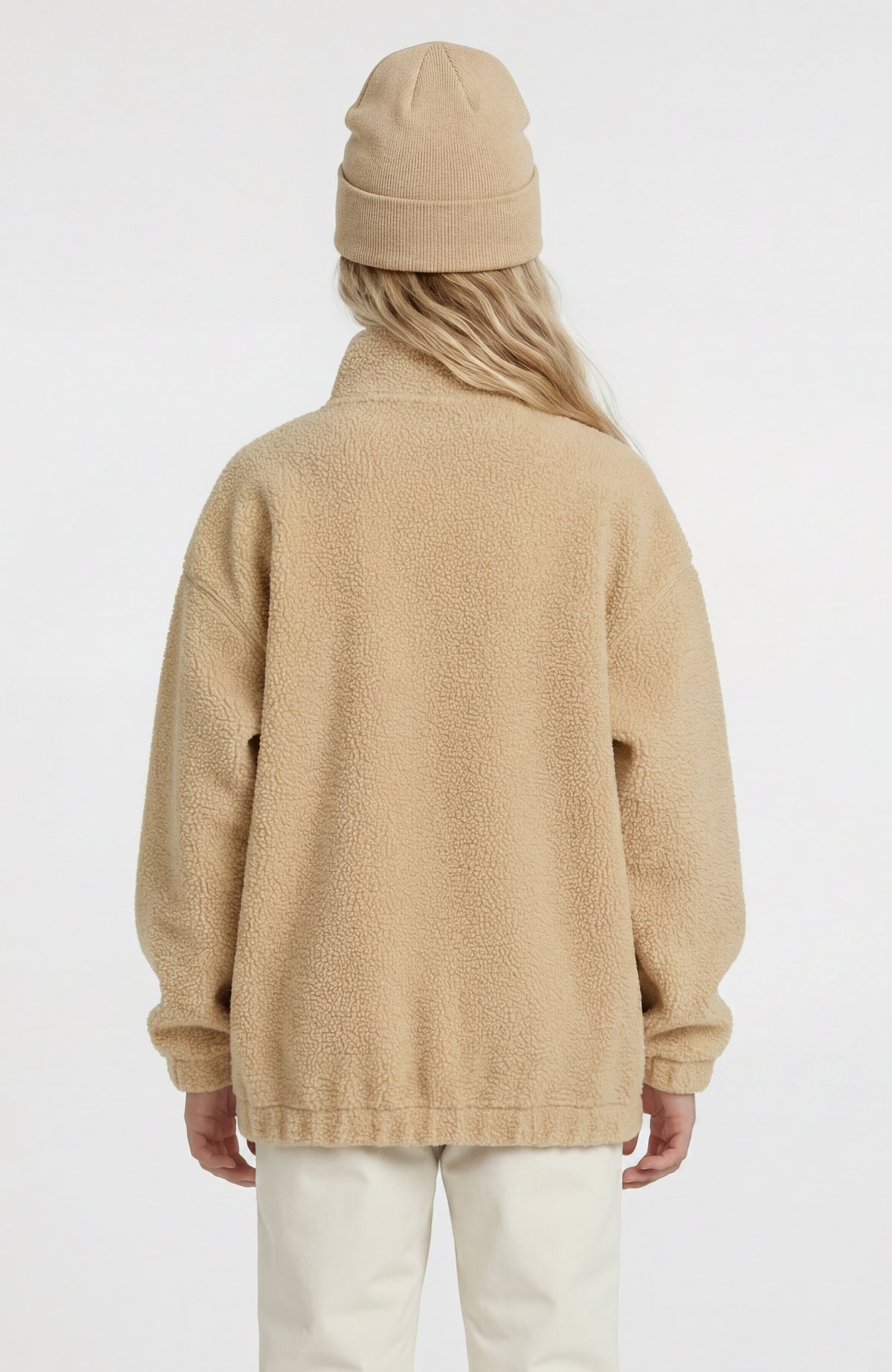 Flauschige Fleecejacke für Mädchen, beige, Rückansicht am Model mit elastischem Bund