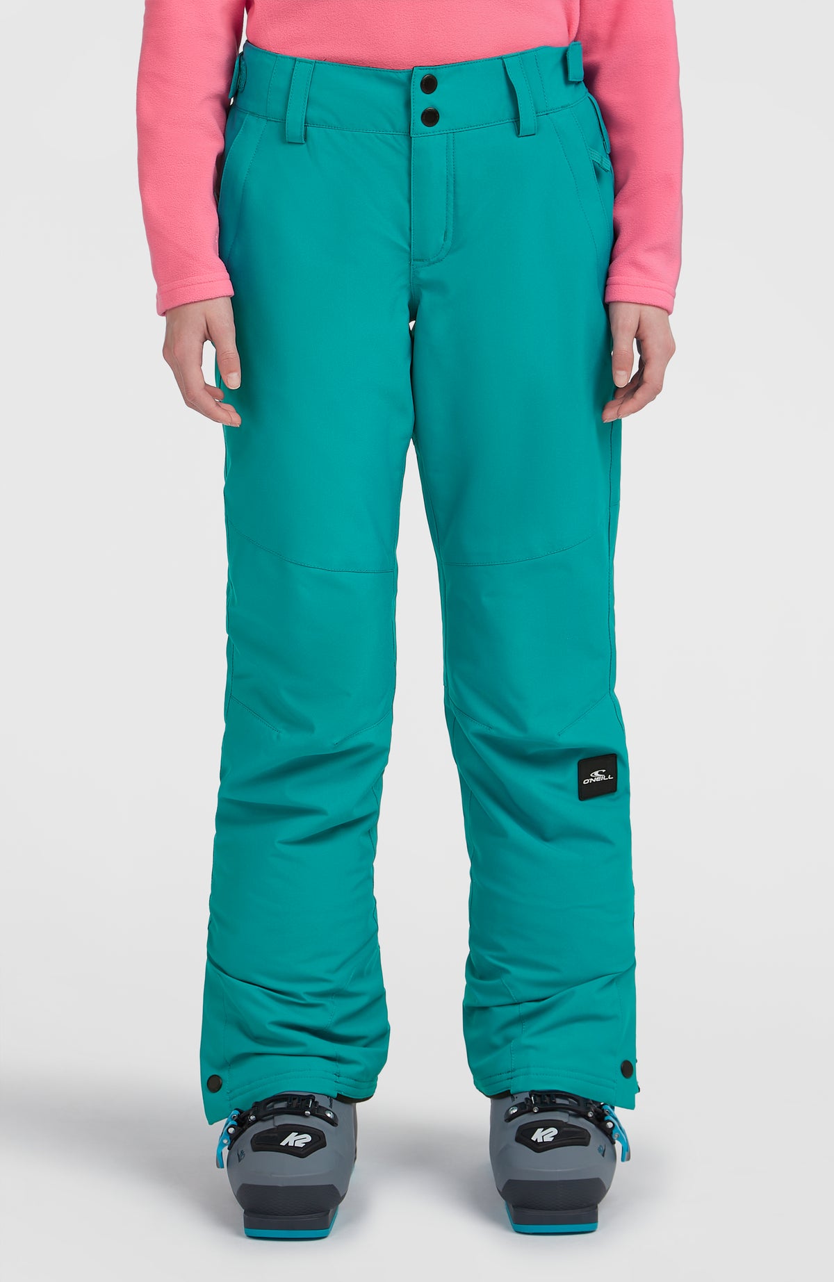 FWC'Cruz Skihose für Mädchen, blau, Vorderansicht am Model mit Logo-Patch am Bein