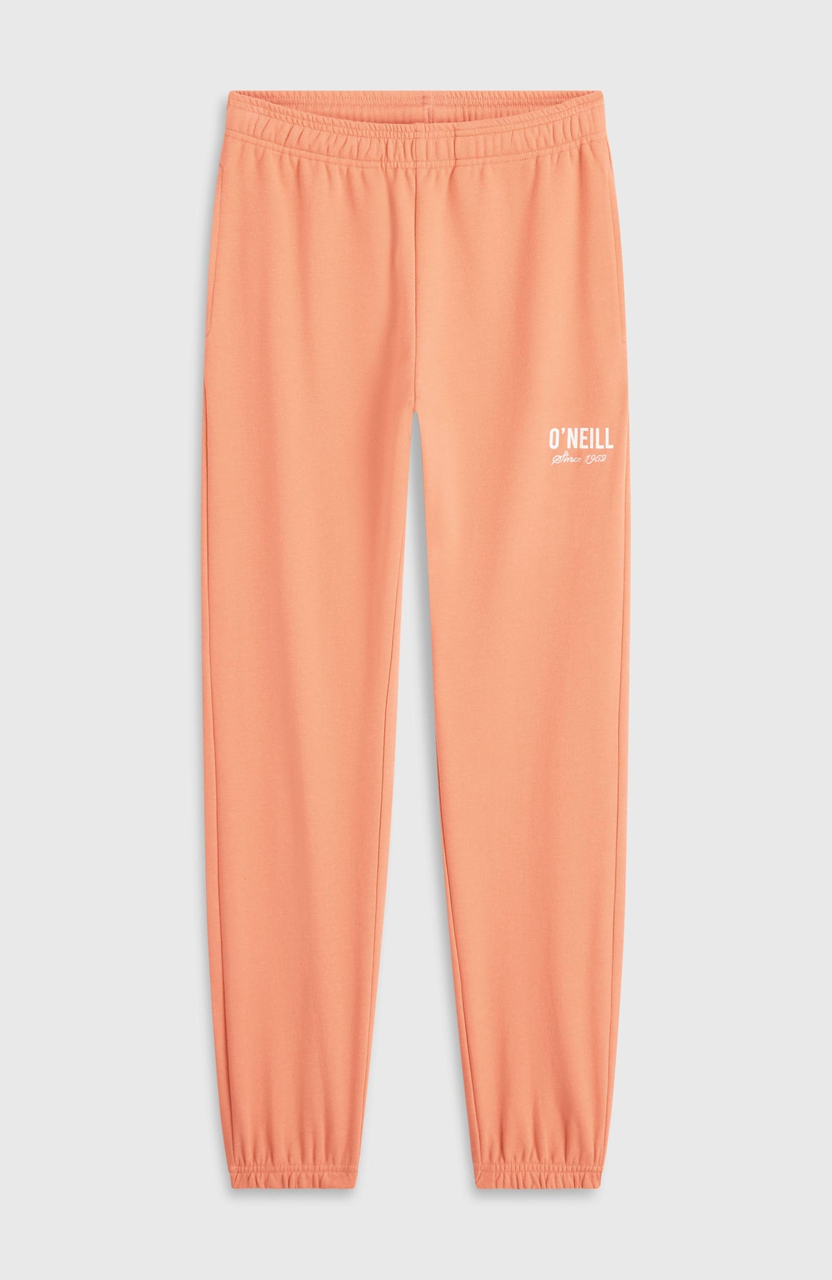 Essentials Jogginghose für Mädchen, orange mit Logo-Print in Weiß, flach liegend von vorne
