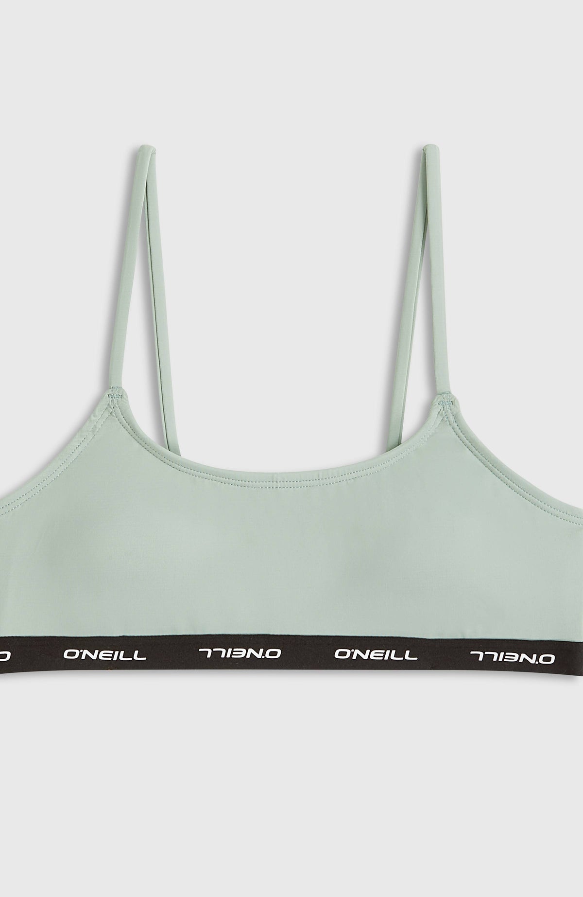 Sport Bikini-Set für Mädchen, grün, flach liegende Nahaufnahme des Bralette-Tops mit elastischem Logobund