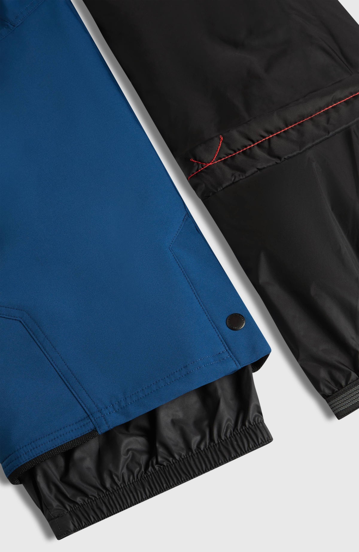 FWC'Cruz Skihose für Jungen, blau, Nahaufnahme des verstellbaren Saumbereichs mit integriertem Schneefang