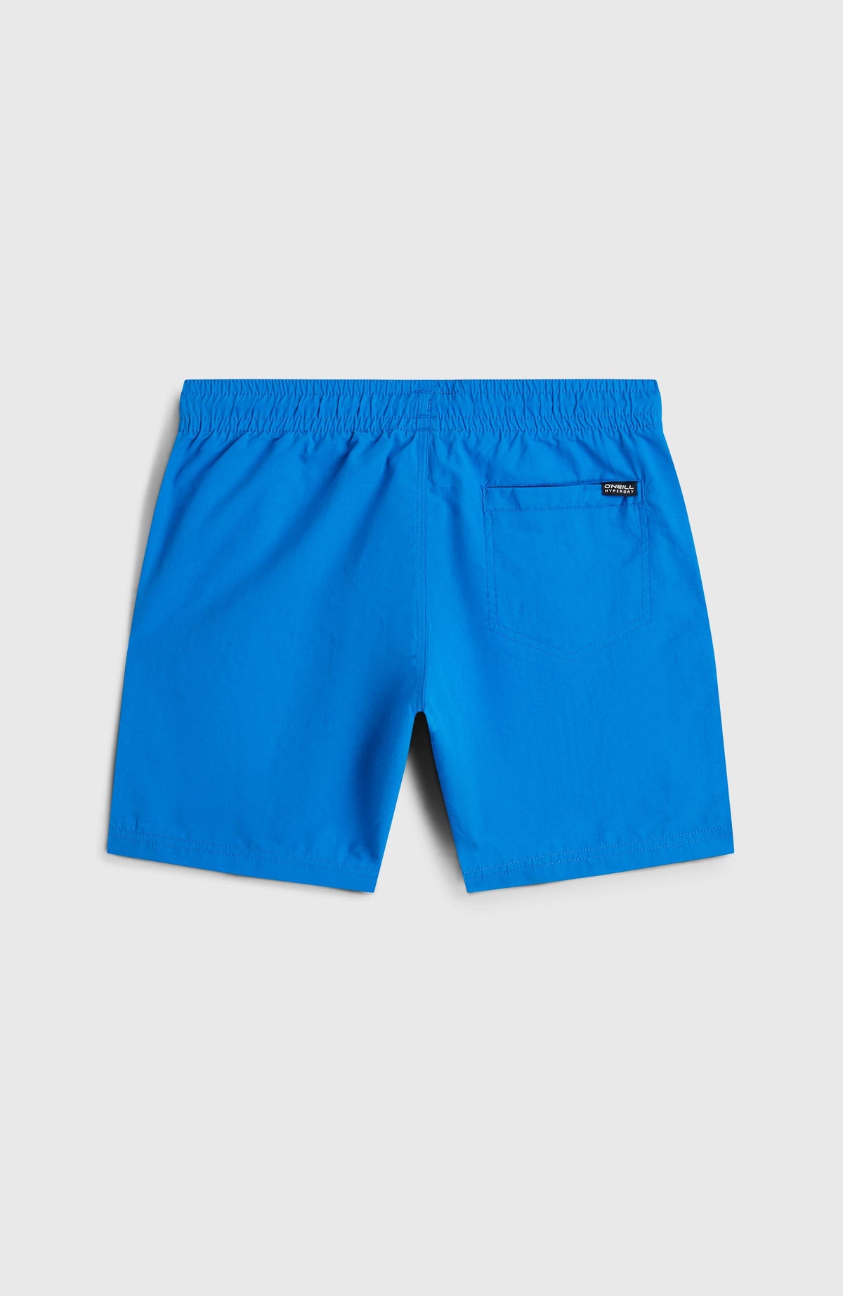 Vert Badehose für Jungen, blau, flach liegend von hinten, Gesäßtasche mit Logo-Label