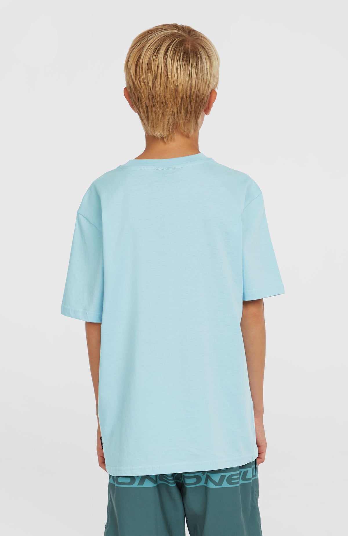 Graphic T-Shirt für Jungen, blau, unifarbene Rückansicht getragen am Model