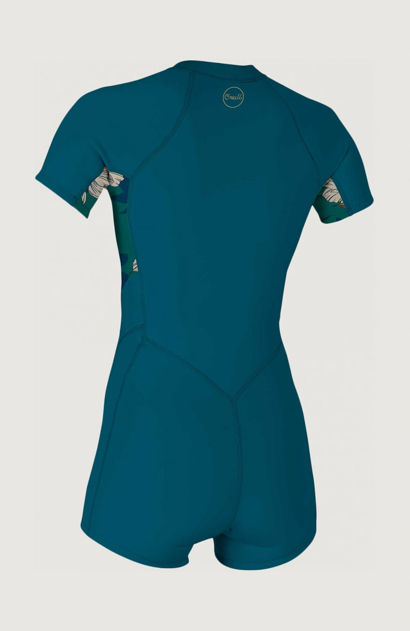 Bahia 2/1mm Neoprenanzug für Damen, blau mit Blumenmuster in Grün und Beige, freigestellt von hinten mit Logo im Nacken