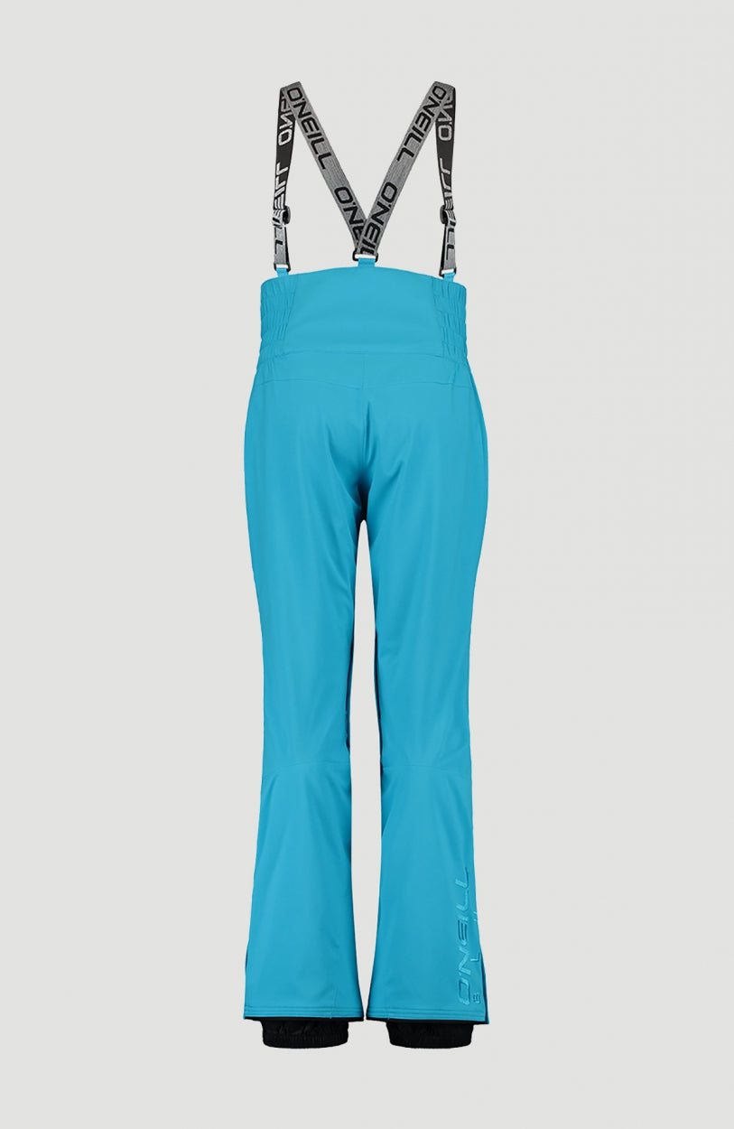 Ocean Mission Snow Pants Schneehose für Damen, türkis, freigestellt von hinten mit gekreuzten Hosenträgern