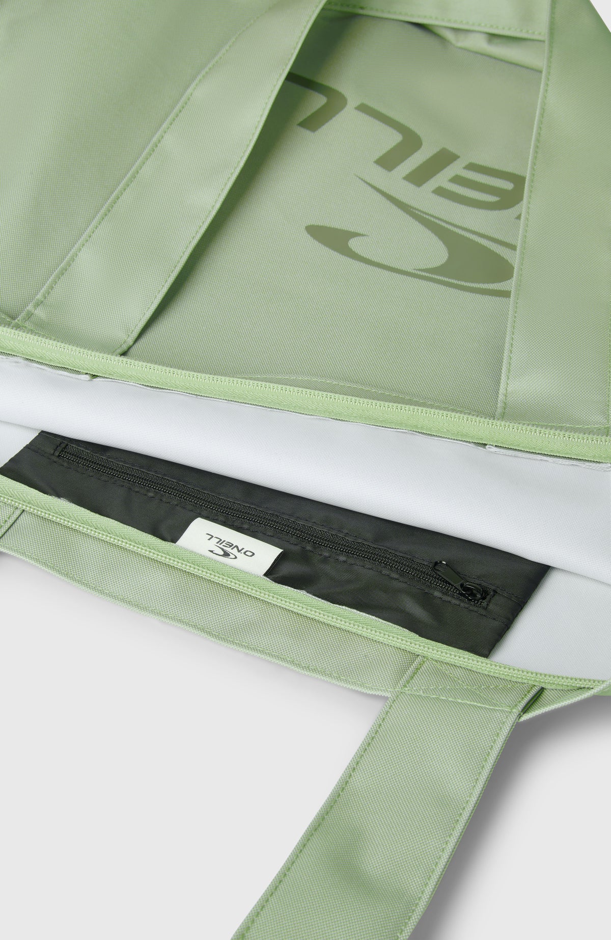 Nahaufnahme der geöffneten grünen Coastal Tote Bag Tasche mit Reißverschluss-Innentasche