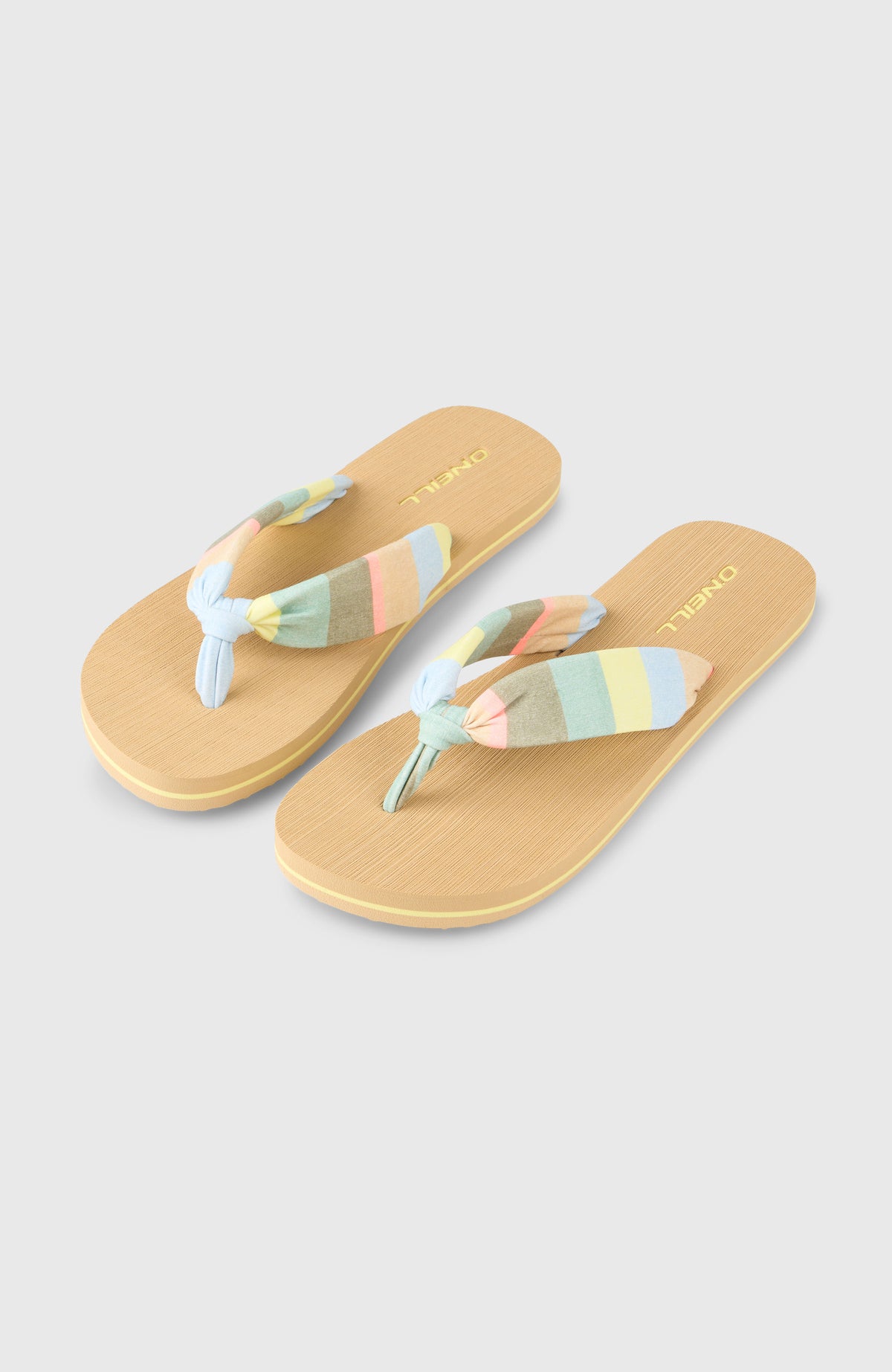 O'Neill Ditsy Sun Sandalen für Damen, gelb mit Streifenmuster in Blau und Rosa, freigestellt von schräg oben