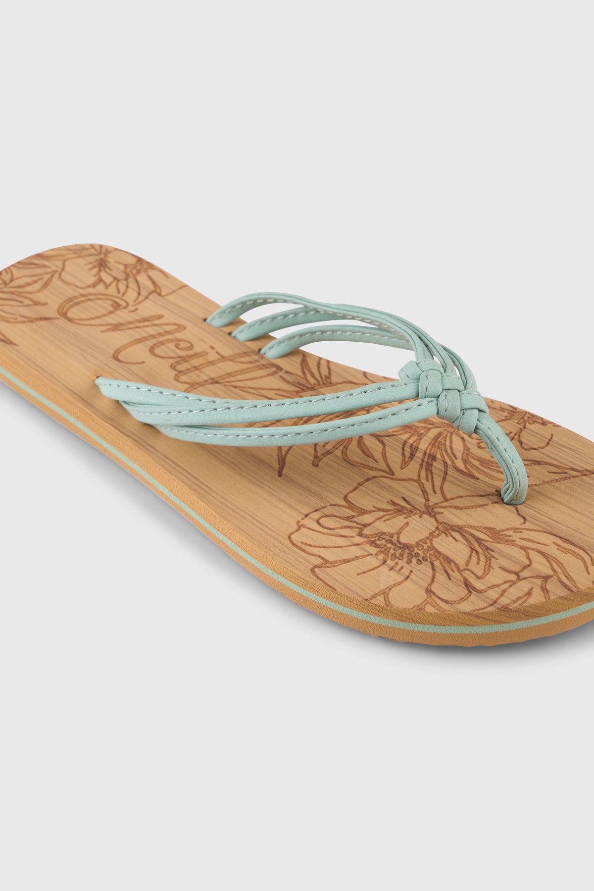 Ditsy Sandalen für Damen, grün mit Blumenmuster in Braun, Nahaufnahme des Zehenstegs mit Knoten