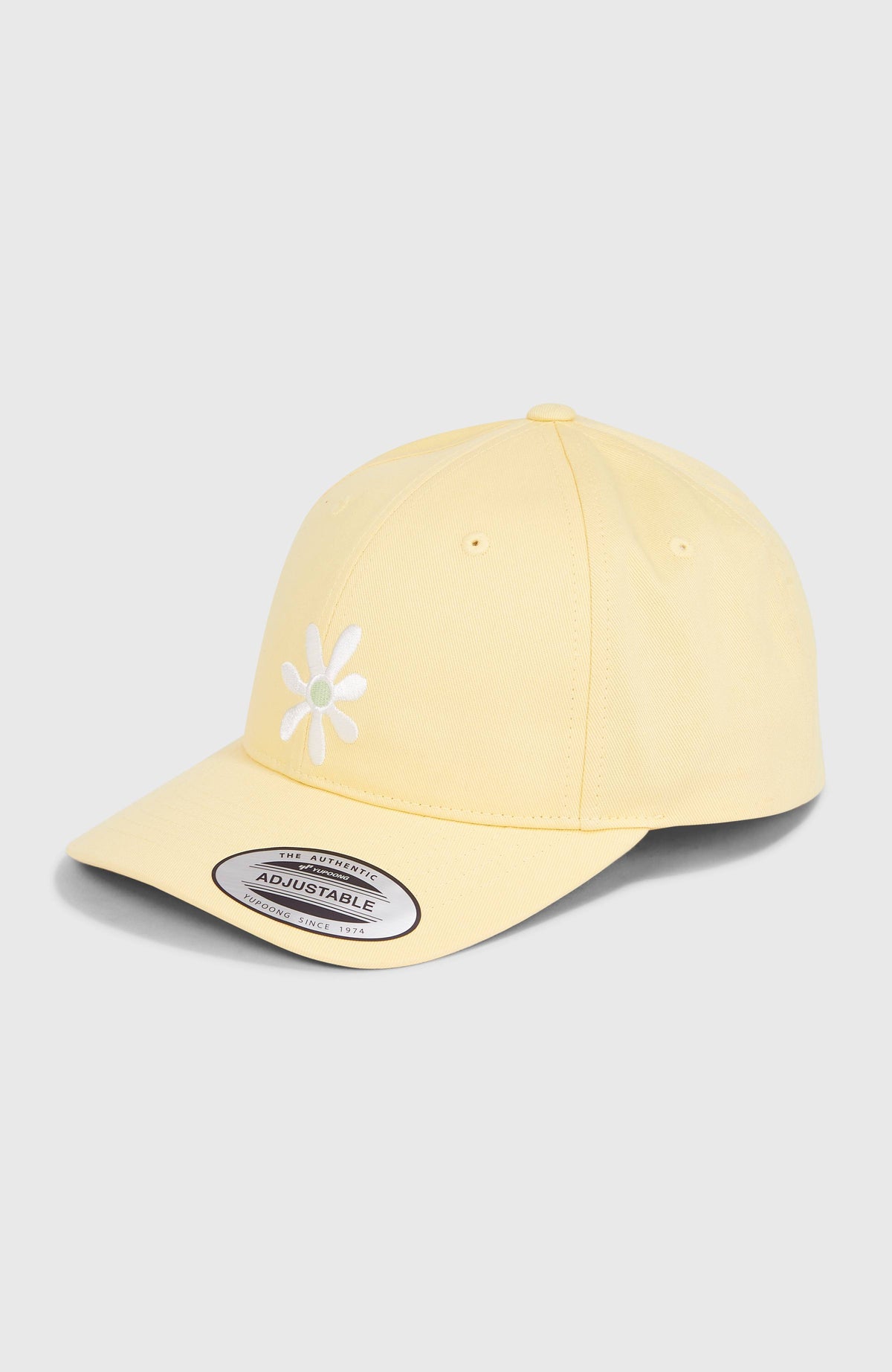 O'Neill Beach Vintage Cap für Damen, gelb mit Blumen-Stickerei in Weiß, freigestellt von schräg vorne