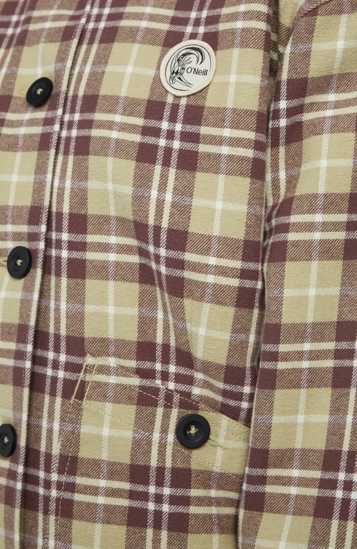 O'Riginals Jacke mit Fleecefutter für Damen, grau mit Karomuster in Braun und Weiß, Nahaufnahme mit Logo-Badge