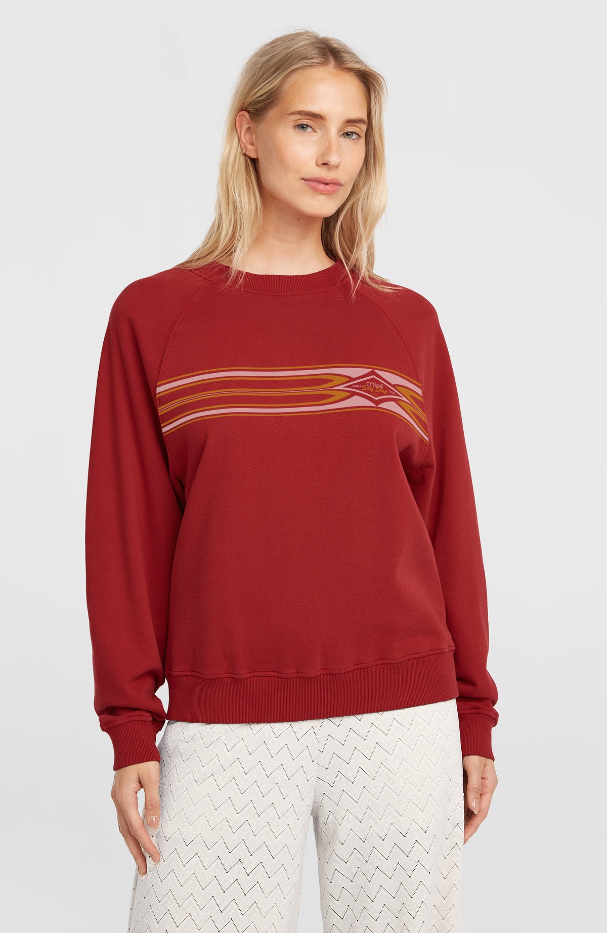 O'Neill O'Riginals Crewneck Sweatshirt für Damen, rot mit Grafik-Print in Rosa und Orange, Vorderansicht