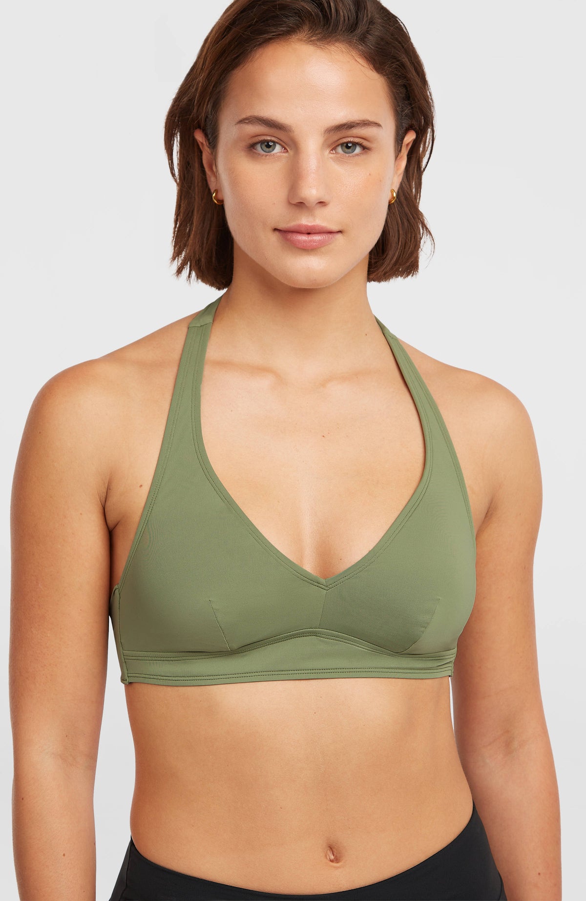 O'Neill Grenada Bikini-Oberteil für Damen, grün, Vorderansicht am Model mit V-Ausschnitt und Halterneck-Trägern