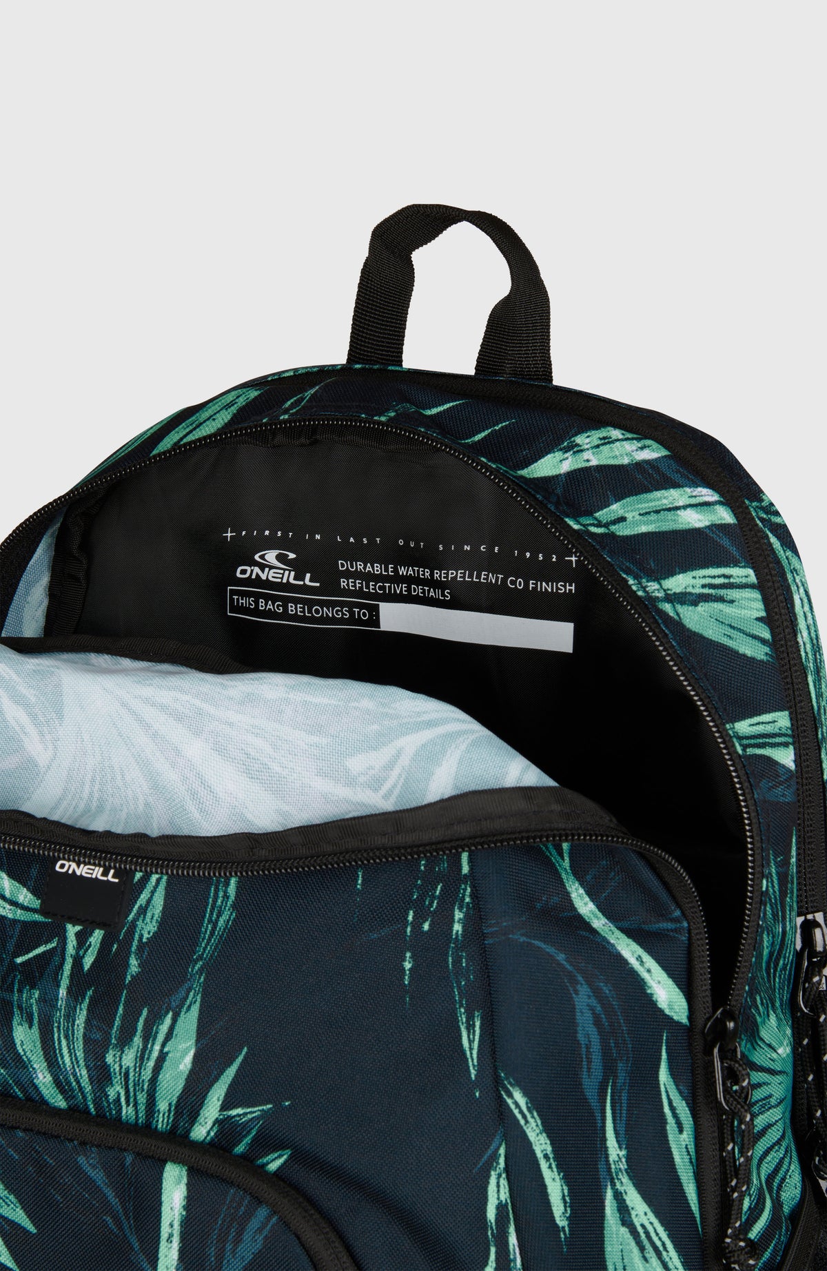 Wedge Rucksack für Herren, blau mit Palmenmuster in Grün, Nahaufnahme des geöffneten Hauptfachs mit Innenfach