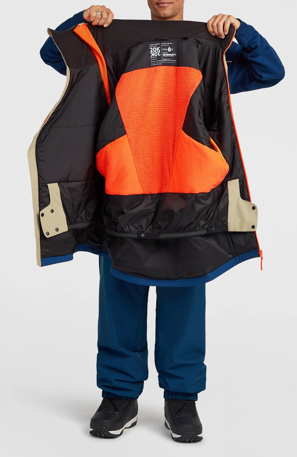 FWC'Play Asymmetric Ski- und Snowboardjacke, beige, Innenansicht mit Schneefang und orangefarbenem Futter