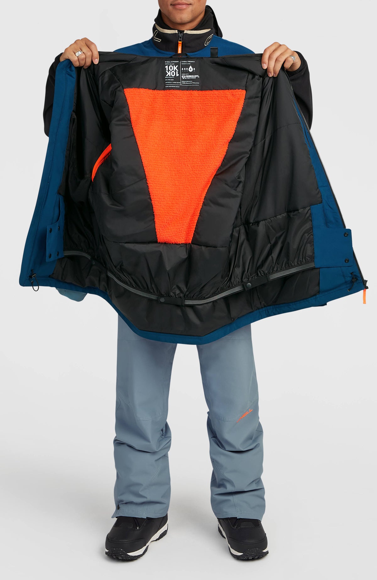 FWC'Cruz Break Point Skijacke für Herren, blau, geöffnete Jacke am Model mit orangefarbenem Innenfutter