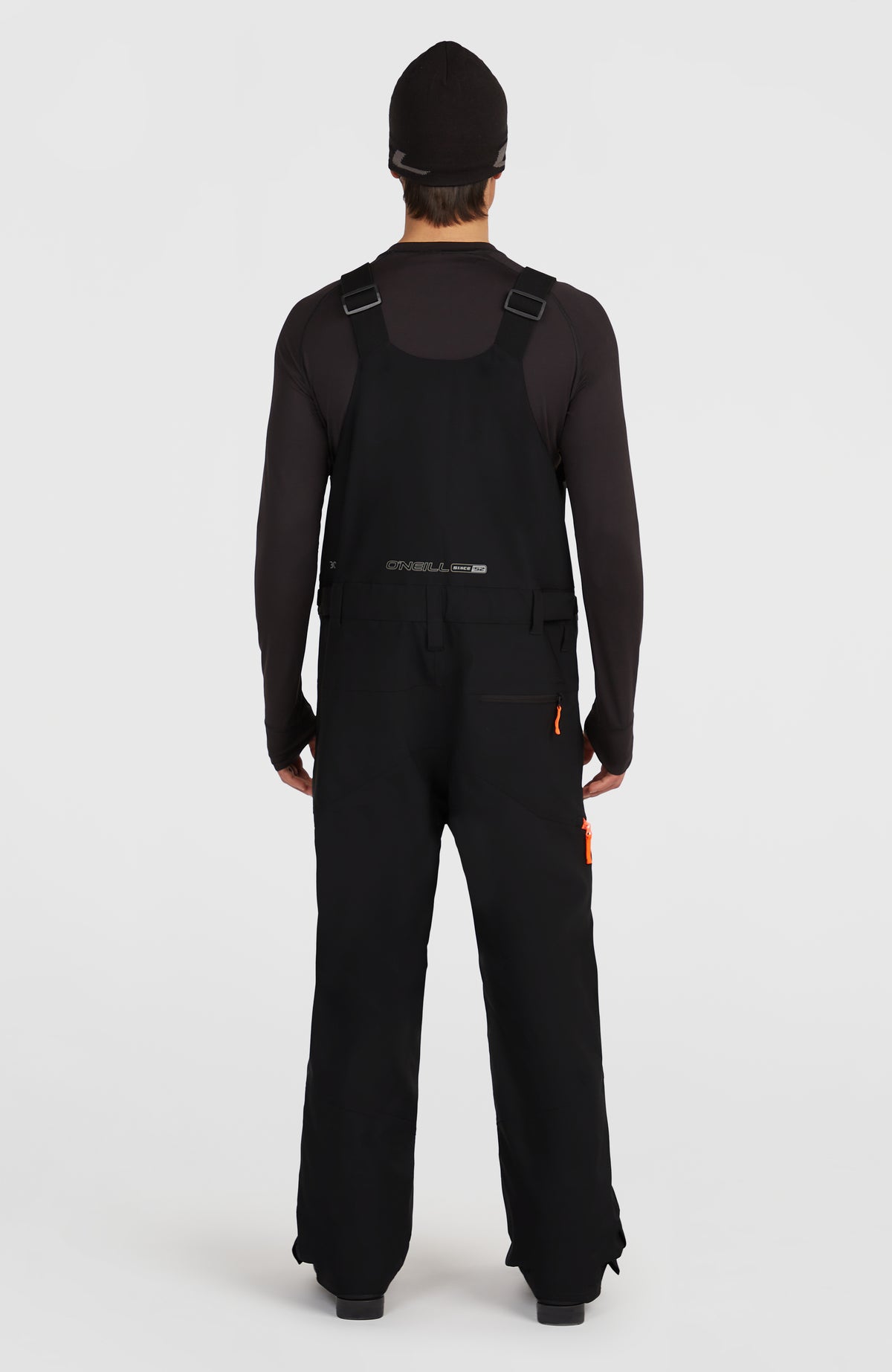 FWC'Peak Bib Skihose für Herren, schwarz, Rückansicht getragen am Model mit Reißverschlusstasche an der Rückseite