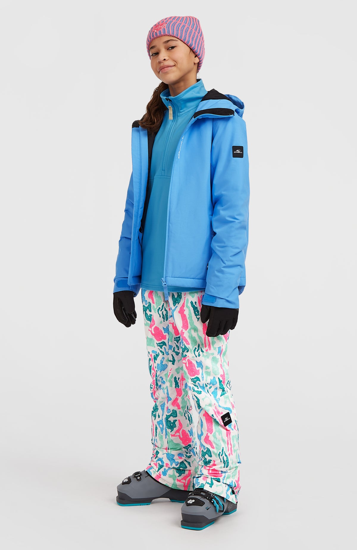 FWC'Cruz Skijacke für Mädchen, blau, Dreiviertelansicht am Model mit geöffnetem Reißverschluss