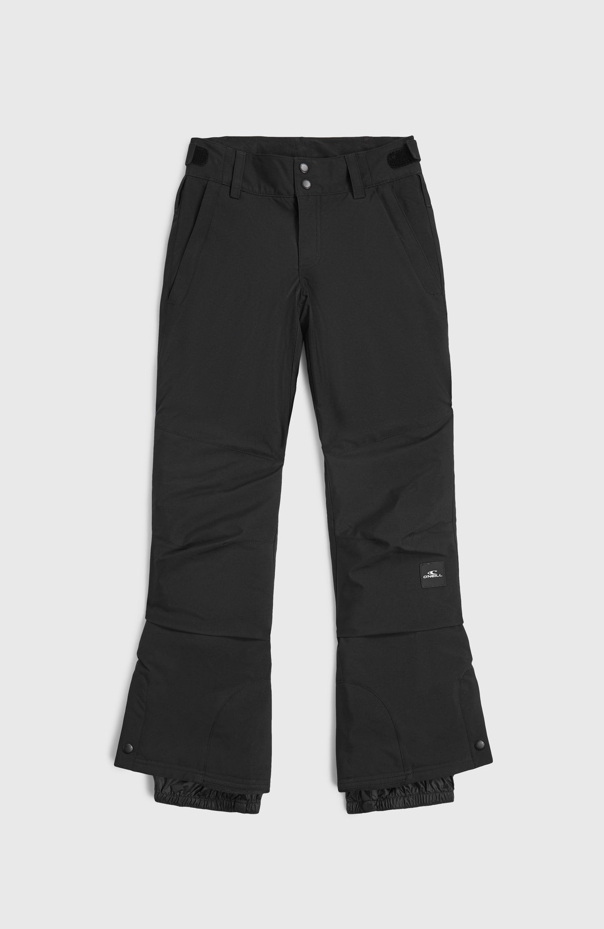 Schwarze FWC'Cruz Skihose für Mädchen, flach liegend von vorne, Bund mit Druckknöpfen und Taschen