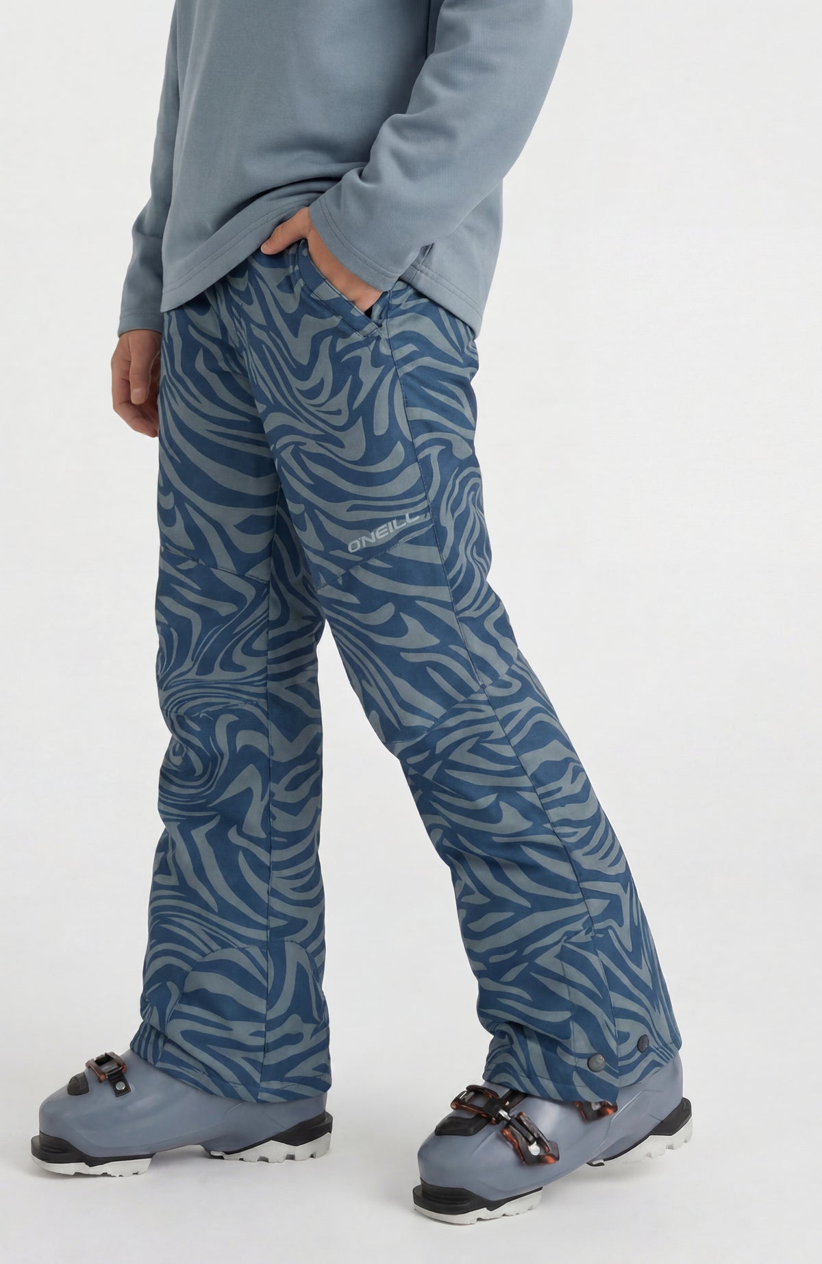 FWC'Cruz Skihose für Mädchen, blau mit Zebramuster in Grau, Seitenansicht mit Logo-Print am Bein
