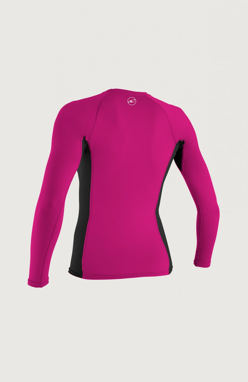 Skins Long Sleeve Crew Schwimmshirt für Mädchen, pink, freigestellt von hinten mit kleinem Logo am Halsausschnitt