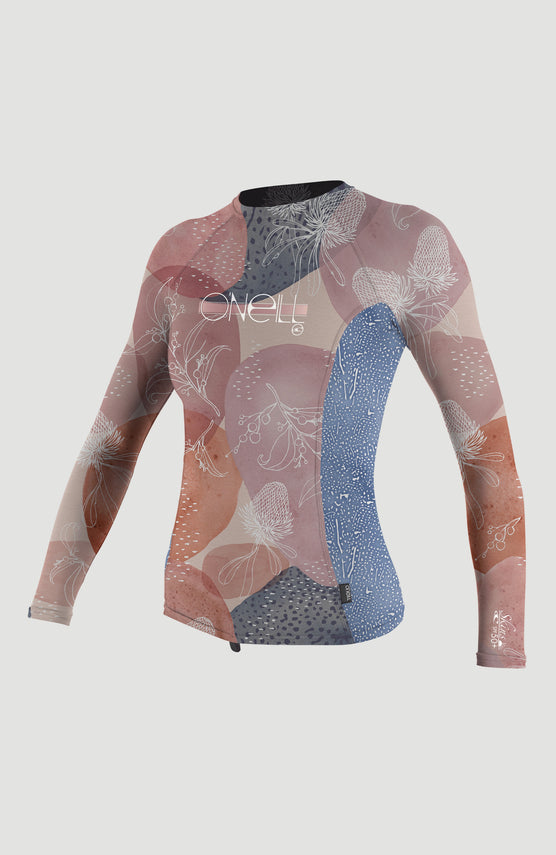 O'Neill Skins Long Sleeve Crew Schwimmshirt für Mädchen, blau mit Blumenmuster in Rosa und Weiß, freigestellt von vorne