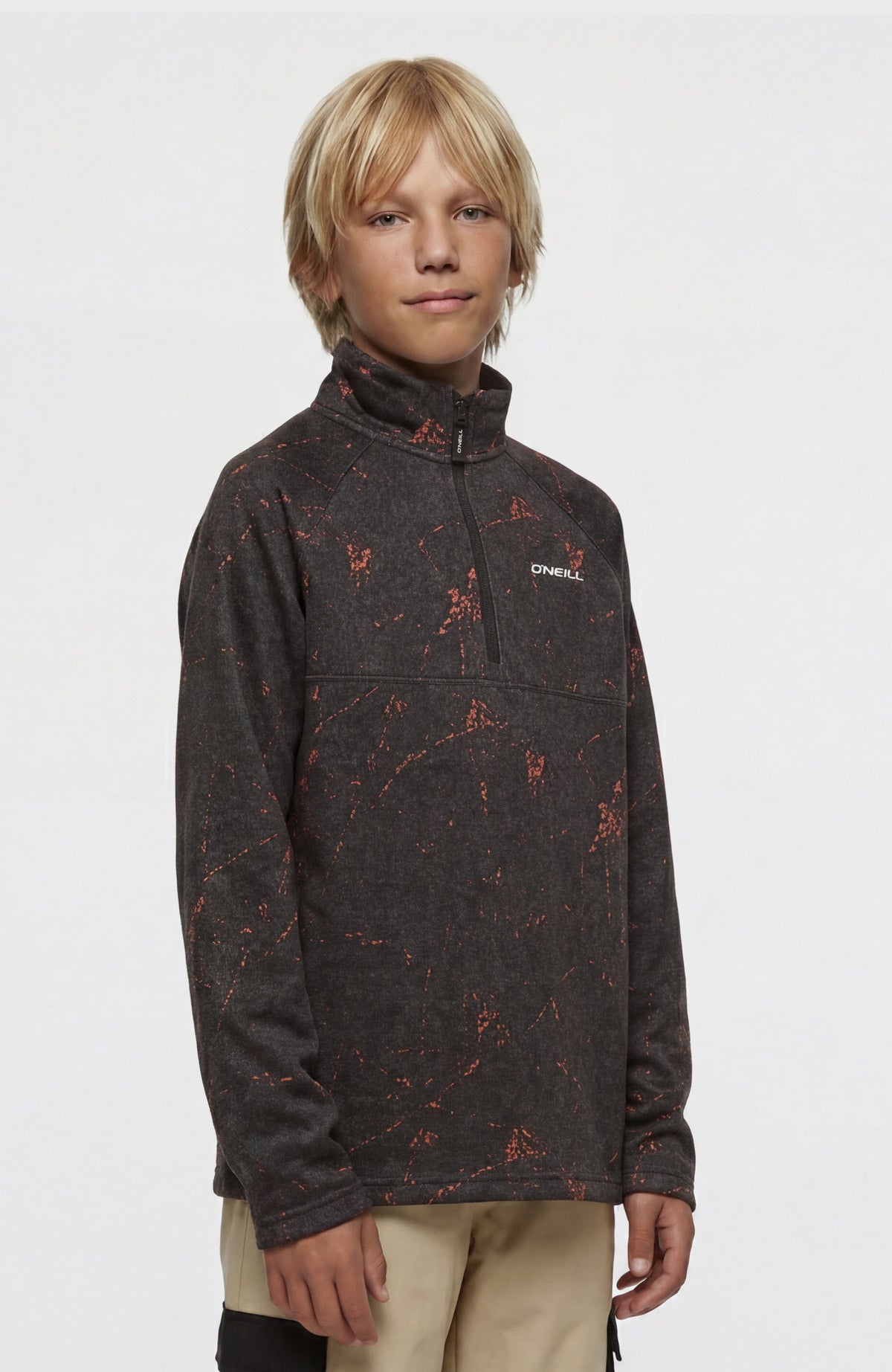 O'Neill FWC'Cruz Printed Half-Zip Fleecepullover für Jungen, schwarz mit Marmormuster in Orange, am Model