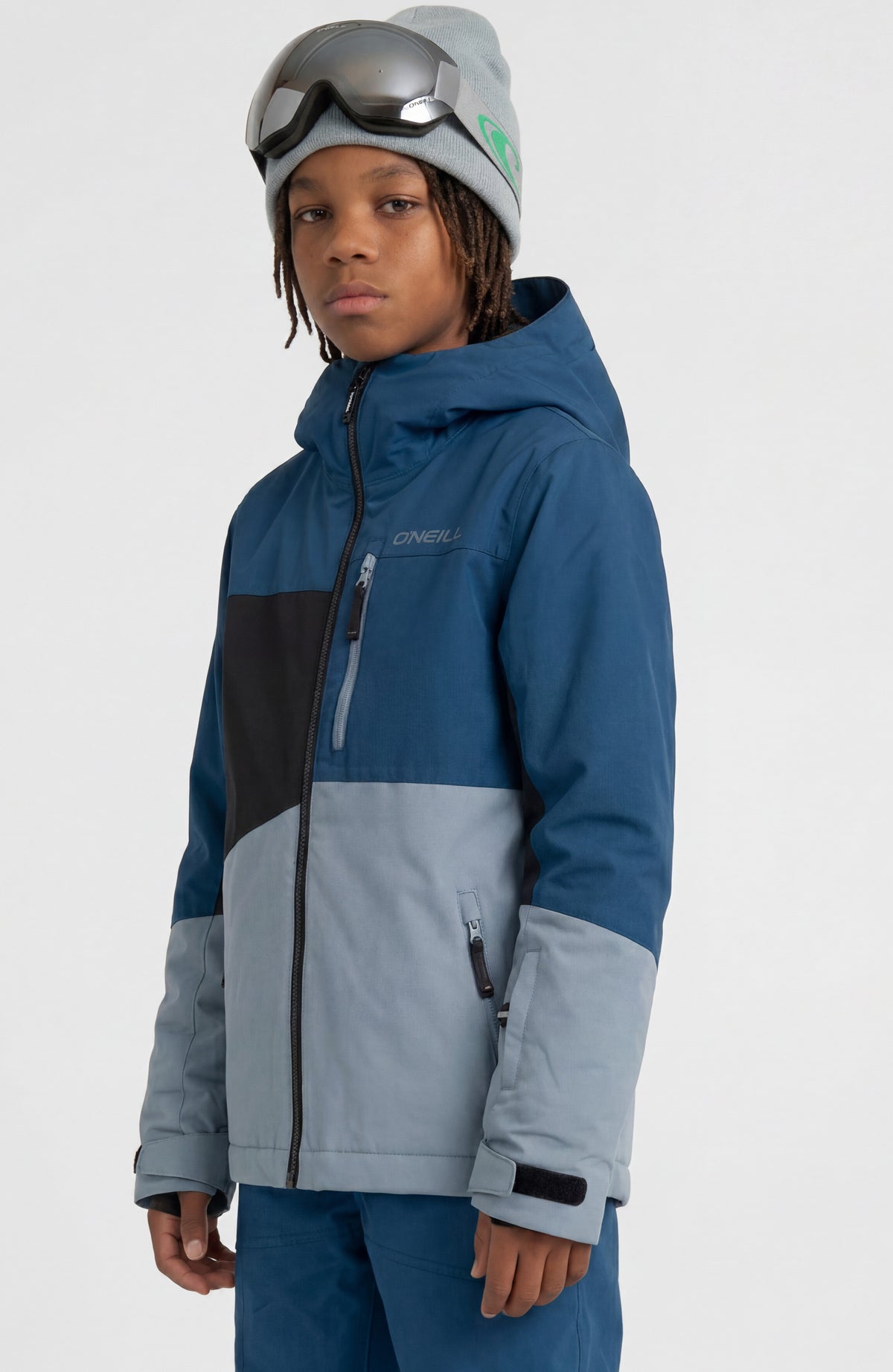 FWC'Cruz Triple Skijacke für Jungen, blau, Halbprofilansicht am Model mit Stehkragen und Reißverschlusstaschen