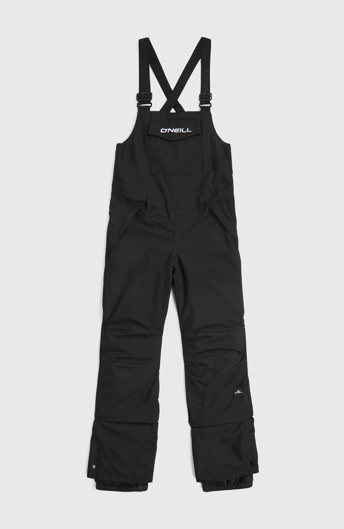 Schwarze FWC'Cruz Bib Skihose für Kinder, flach liegend von vorne mit geräumiger Brusttasche und Trägern