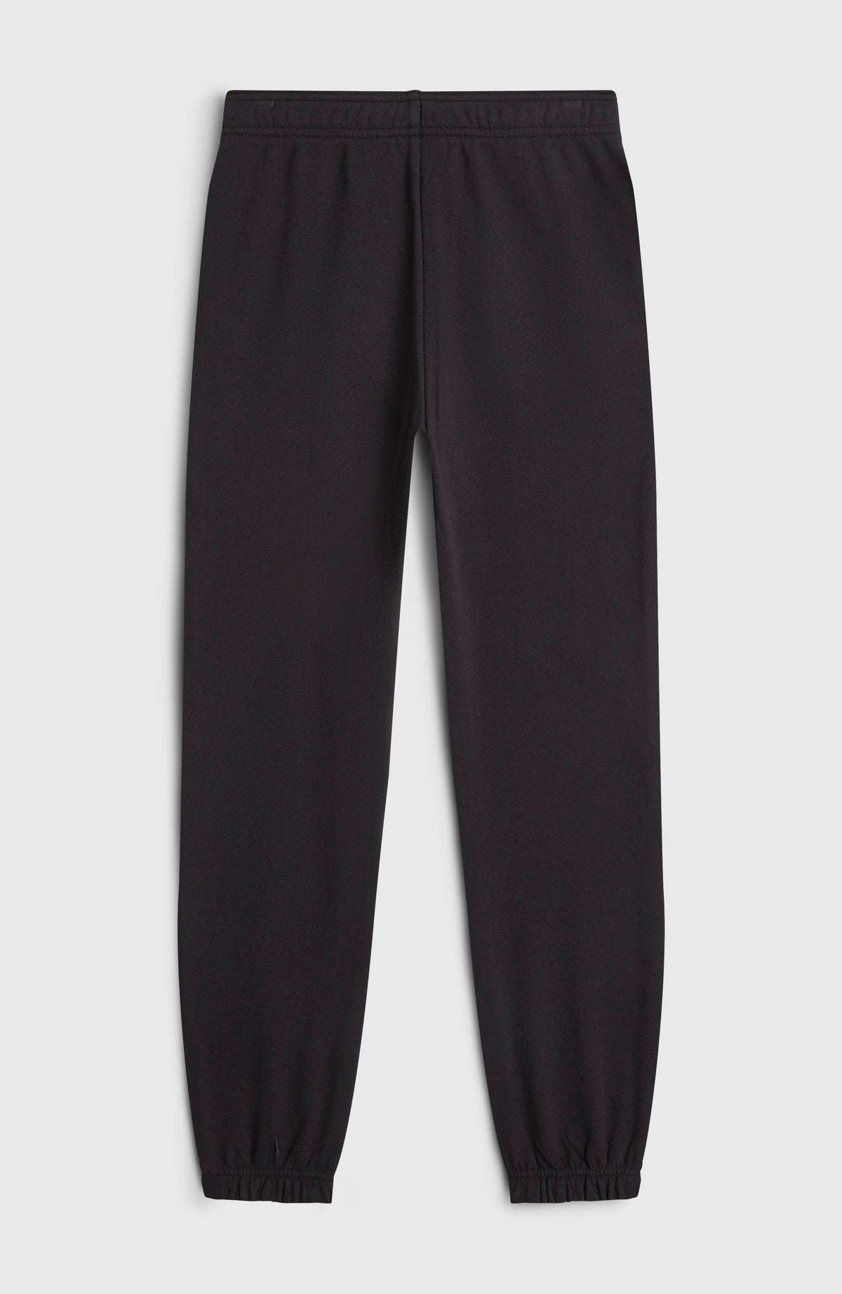 Schwarze Cali Jogginghose für Jungen, flach liegend von hinten mit elastischem Bund und elastischen Bündchen