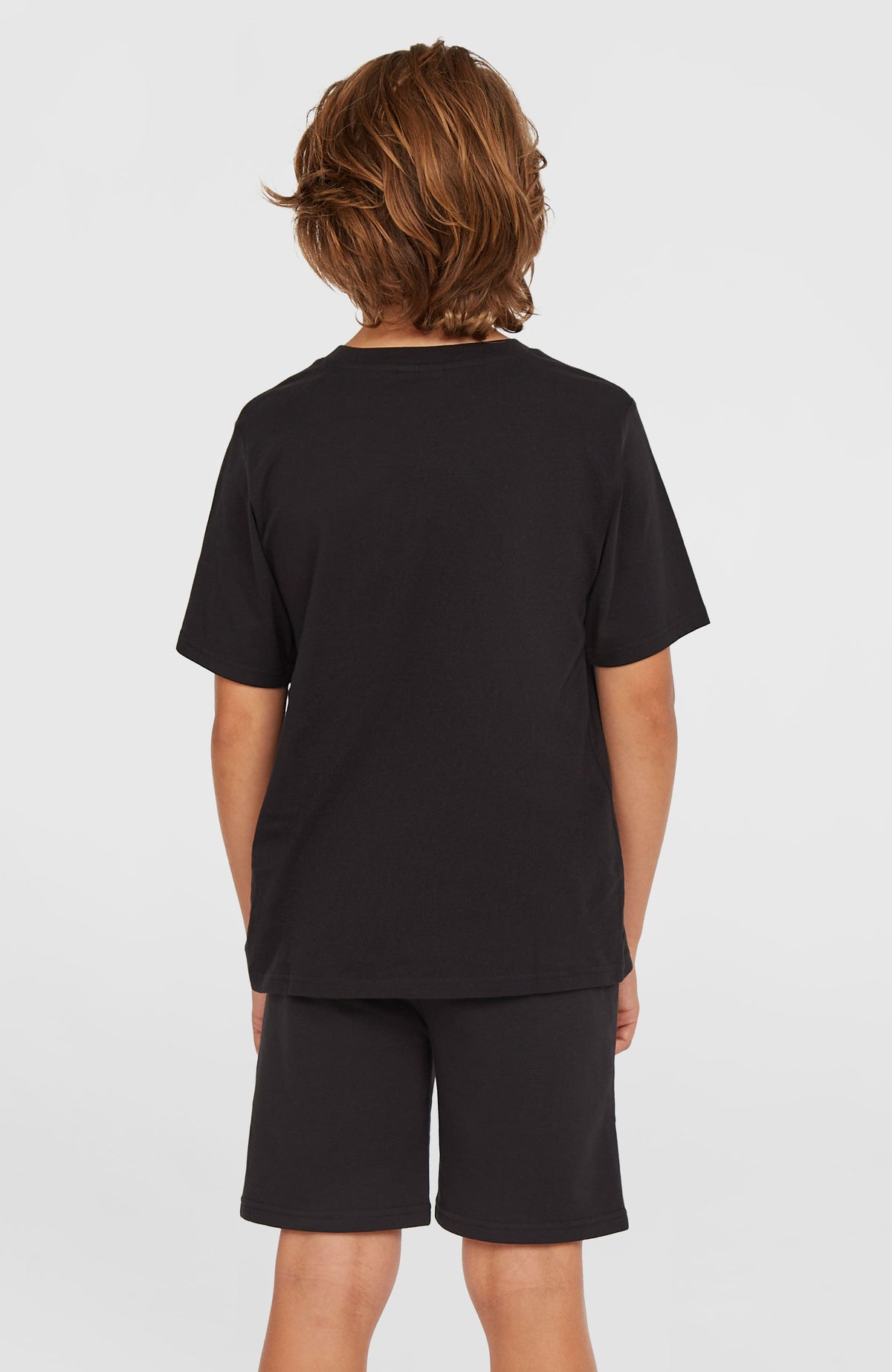 Logo Sweatshorts für Jungen, schwarz, Rückansicht getragen am Model
