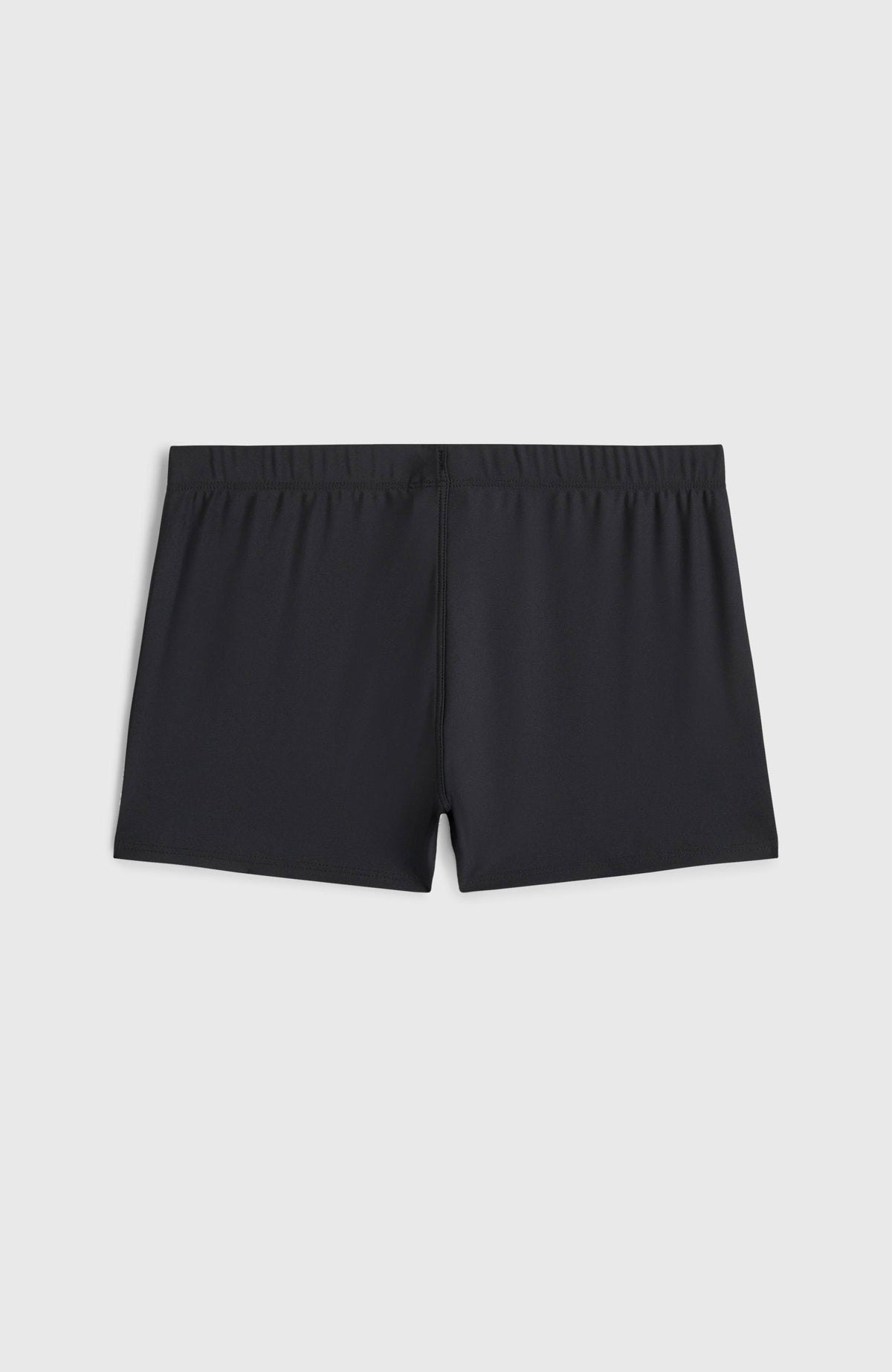 Racer Badehose für Jungen, schwarz, flach liegend von hinten mit elastischem Bund