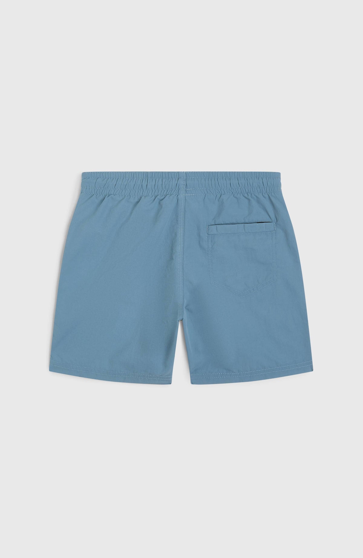 Vert Badehose für Jungen, blau, flach liegend von hinten, aufgesetzte Gesäßtasche