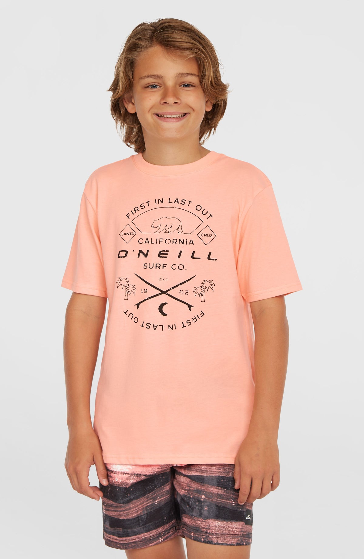 O'Neill Jack O'Neill Muir T-Shirt für Jungen, pink mit Logo-Print in Schwarz, Vorderansicht, am Model