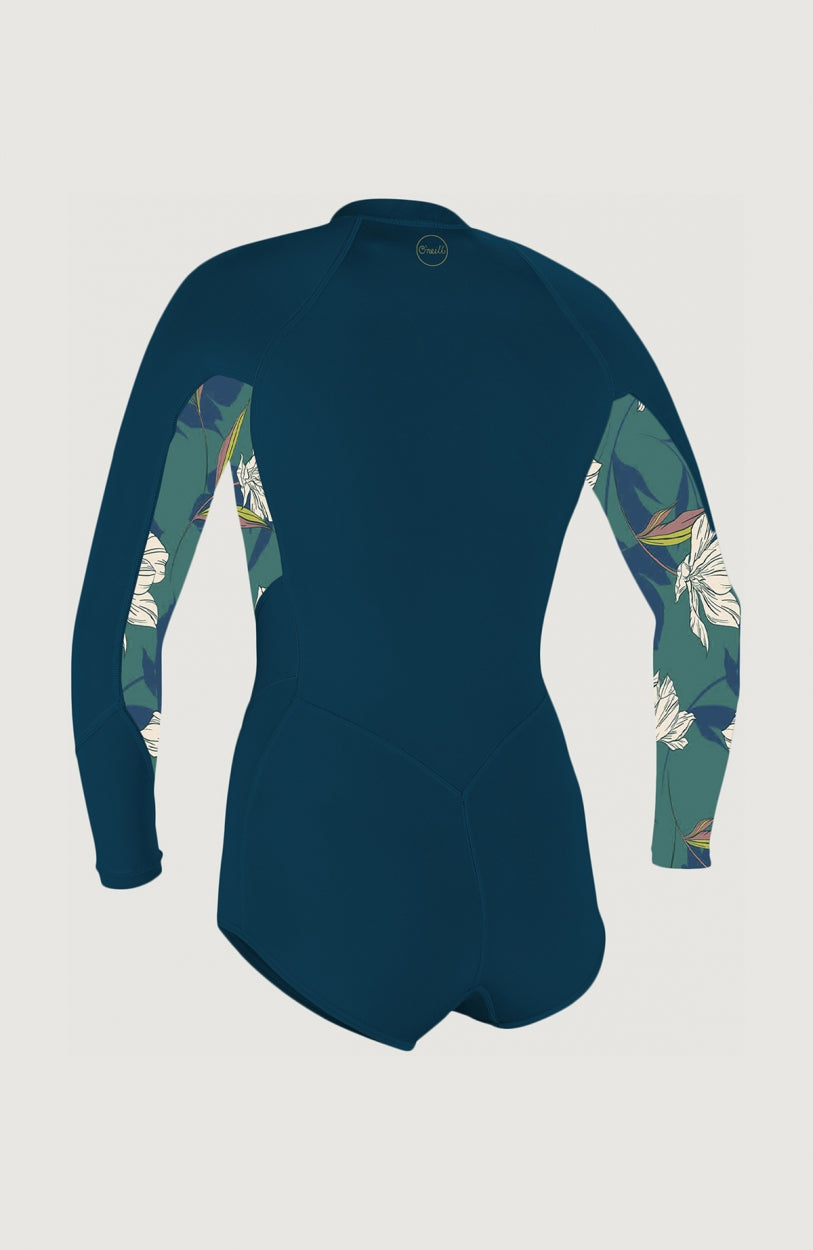 Bahia 2/1mm Neoprenanzug für Damen, blau mit Blumenmuster in Weiß und Grün, freigestellt von hinten, Rückansicht